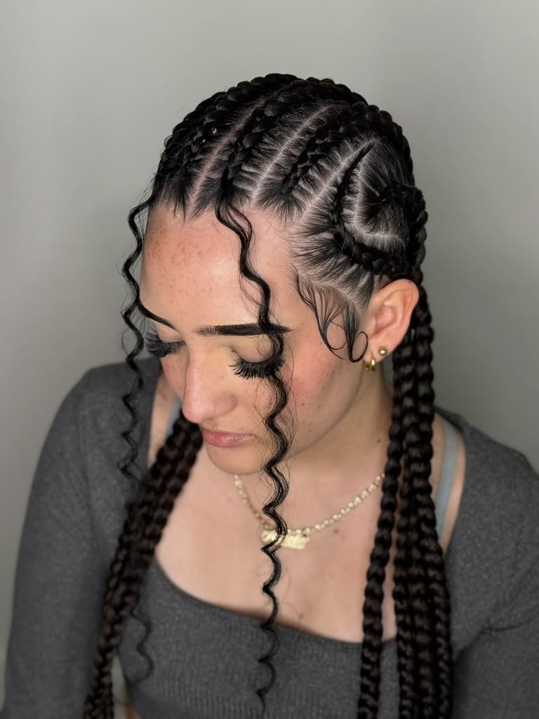 Dark braids on a fair-skinned model, front-facing view