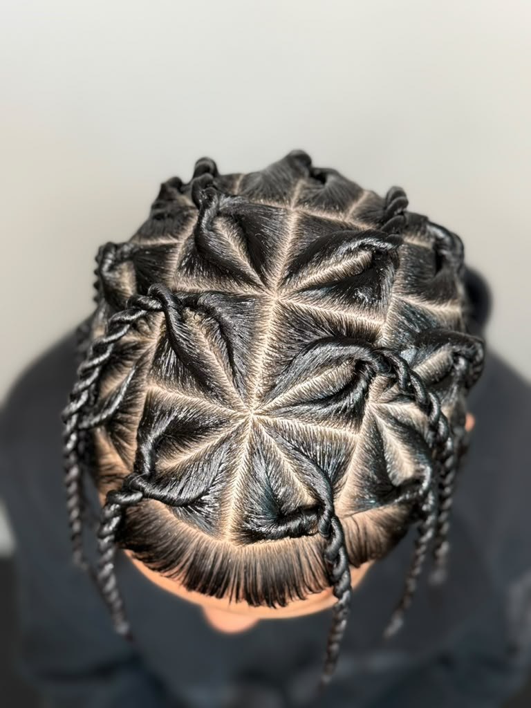 Star-pattern cornrows with top-down view by Yulis